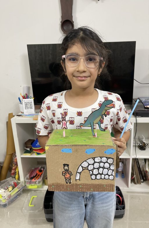 Children at Owtofbox workshops — building, painting and investigating together