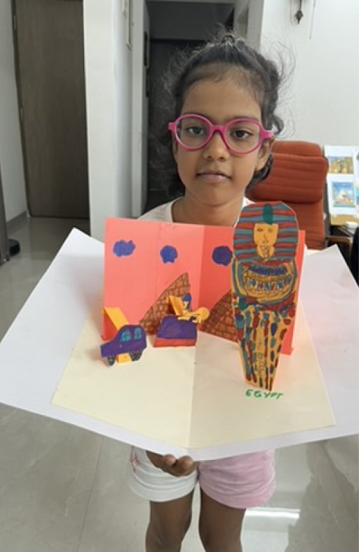 Children at Owtofbox workshops — building, painting and investigating together